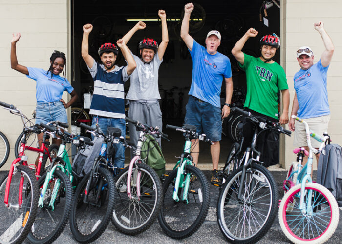 freewheels refugees bicycles volunteers